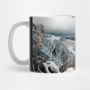 Alone on the mountainside in winter Mug